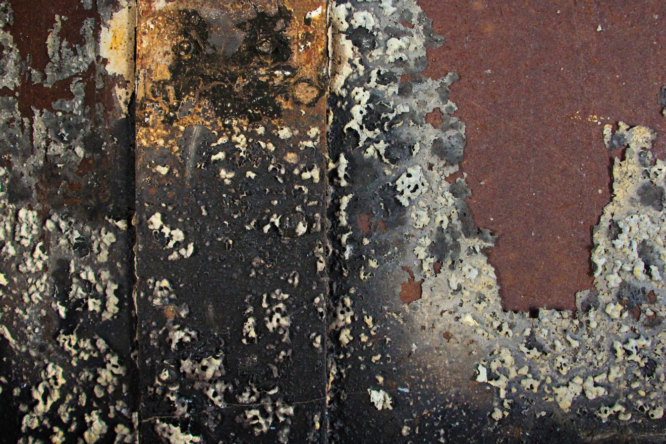 grunge texture metal door burned fire scorched bubbling pain effect