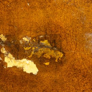 grunge texture painted concrete spray cracked beat up orange brown photo