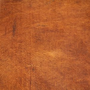leather texture material surface orange bright smooth pattern photo