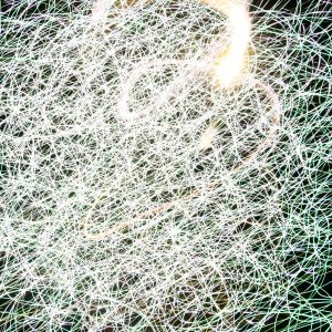 light texture chaos swirling glow white firework straking photo