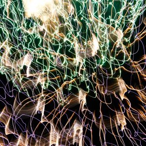 light texture firework explosion blue green wavy blur long exposure photo