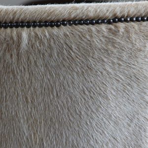 Fabric photo accent chair with hair and beads embedded in pattern