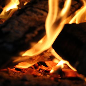 Fire wallpaper photo mid fire with two pieces of wood