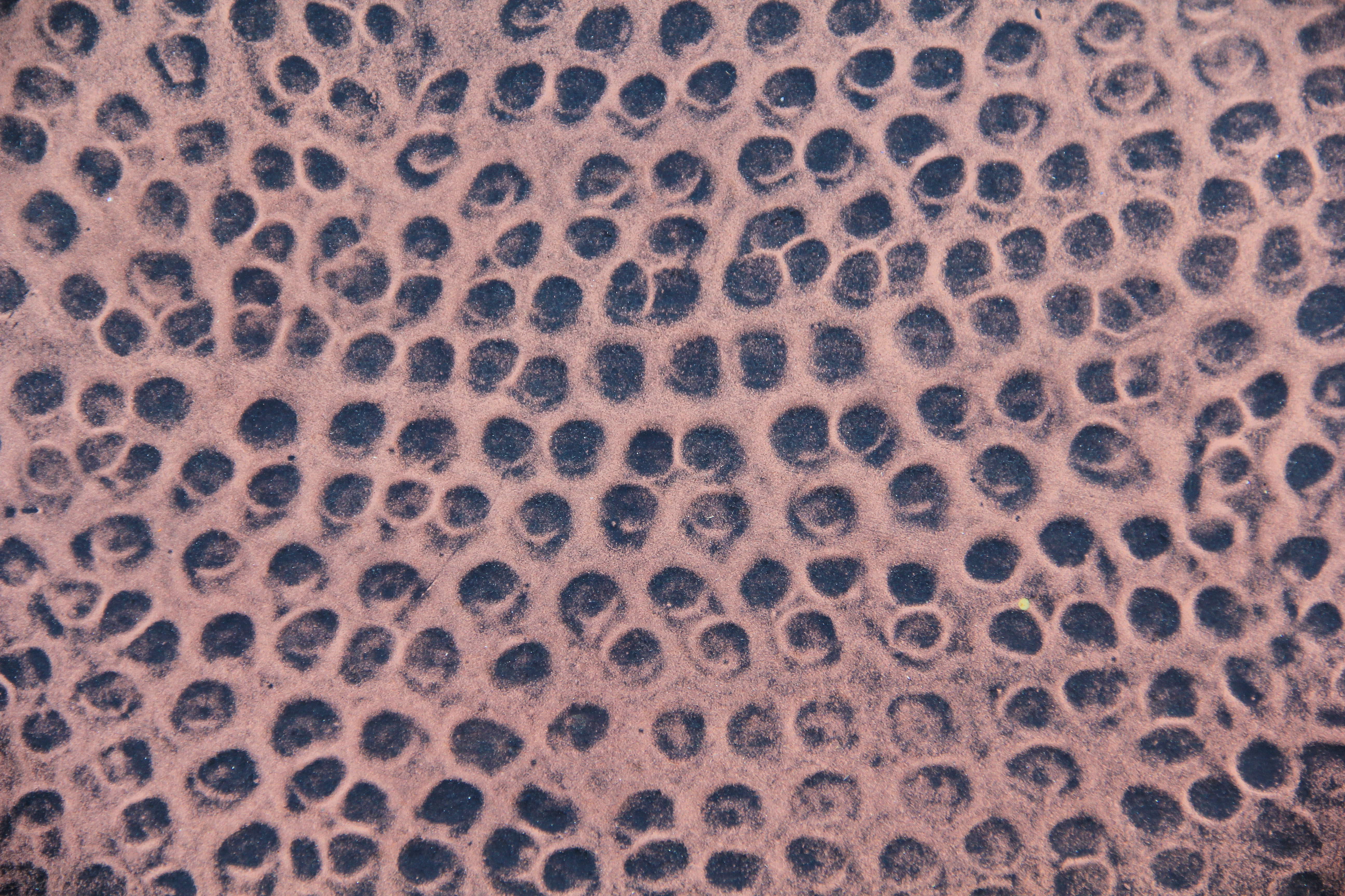 Pitted Copper Metal Texture Outdoor Fireplace Stock Photo