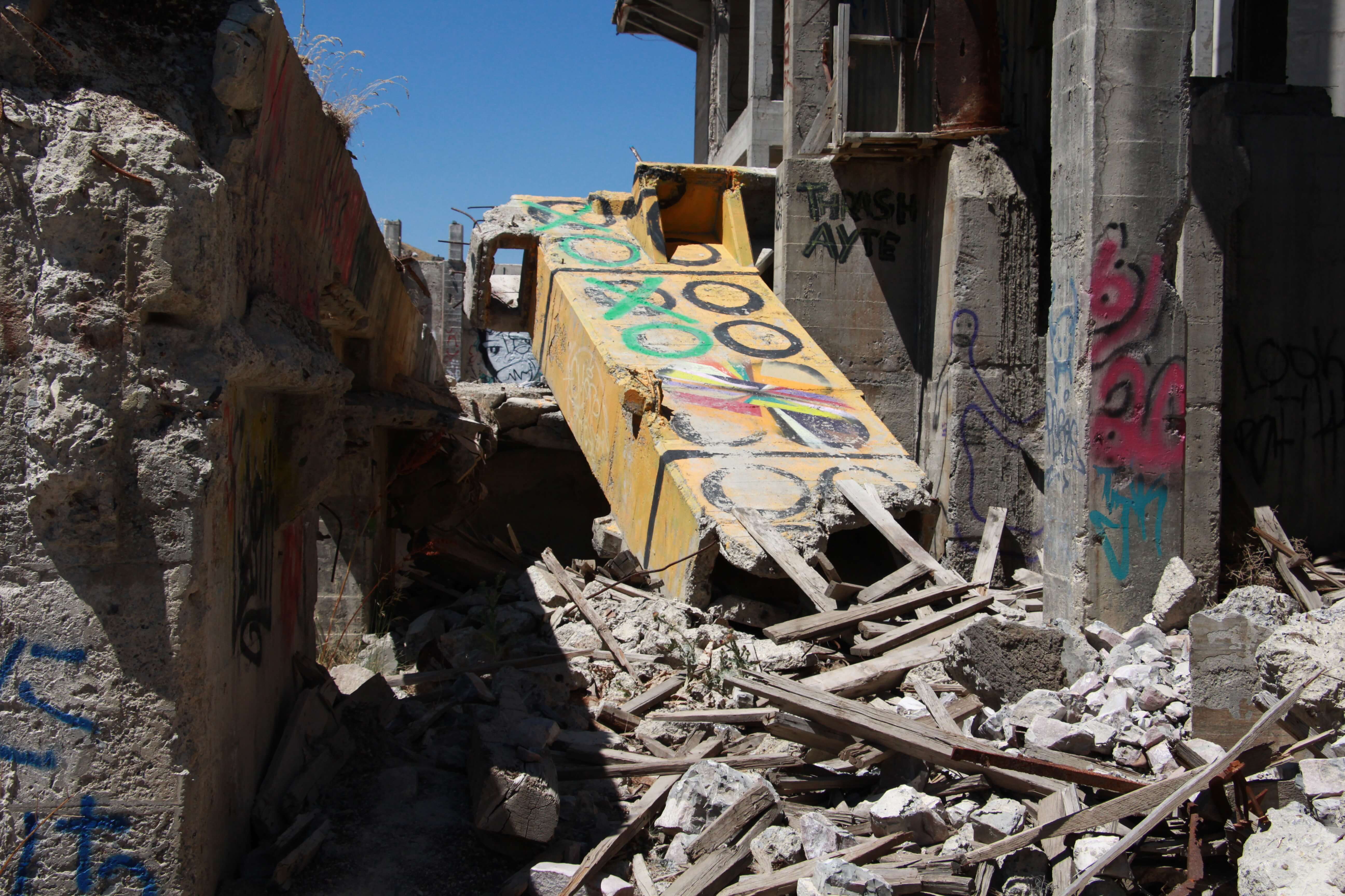 X And O Spray Paint Letters On Broken Tower Graffiti