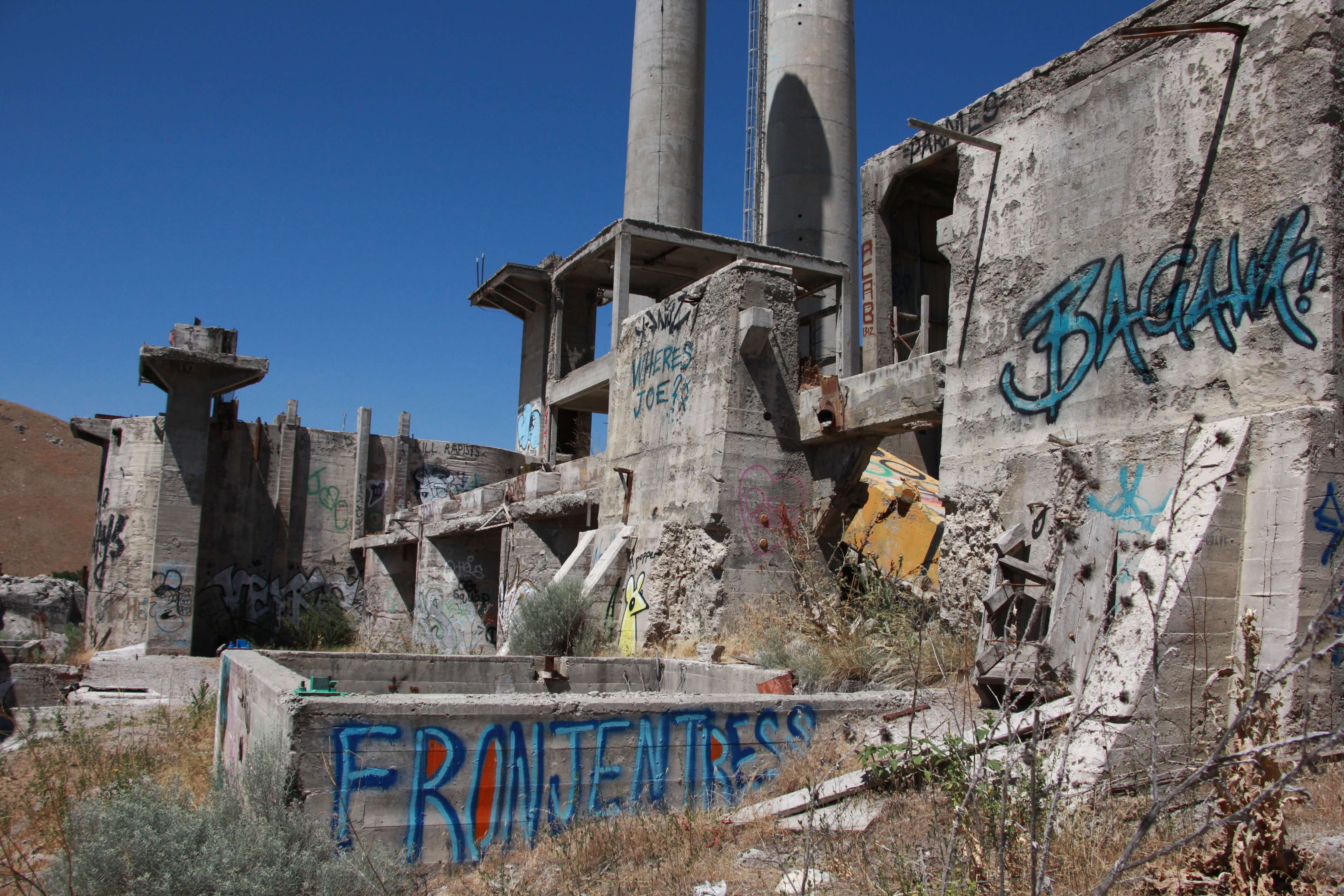 Abandoned Warehouse Spray Painted Outside Graffiti