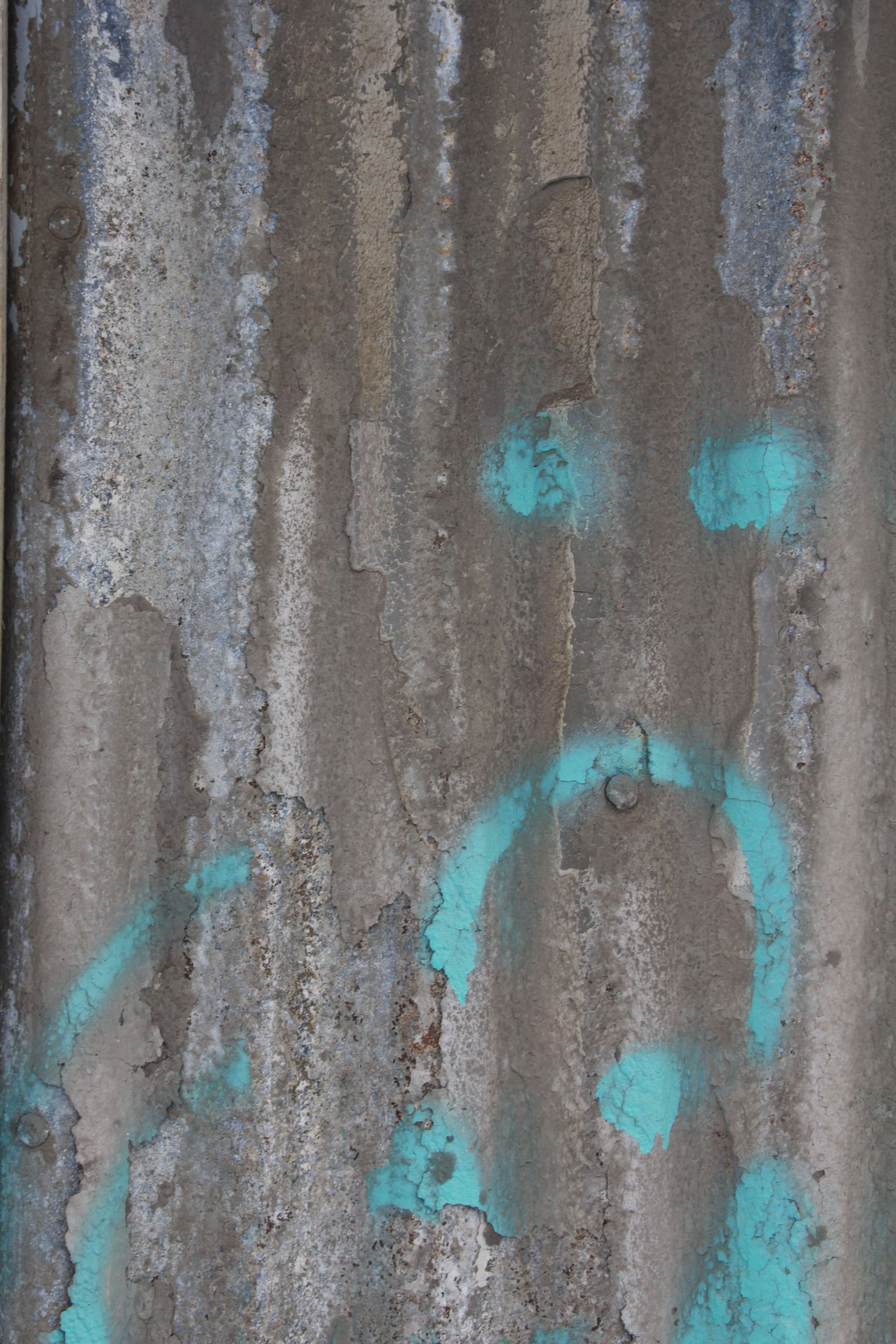 Graffiti Green Figure Spray Paint On Metal Door