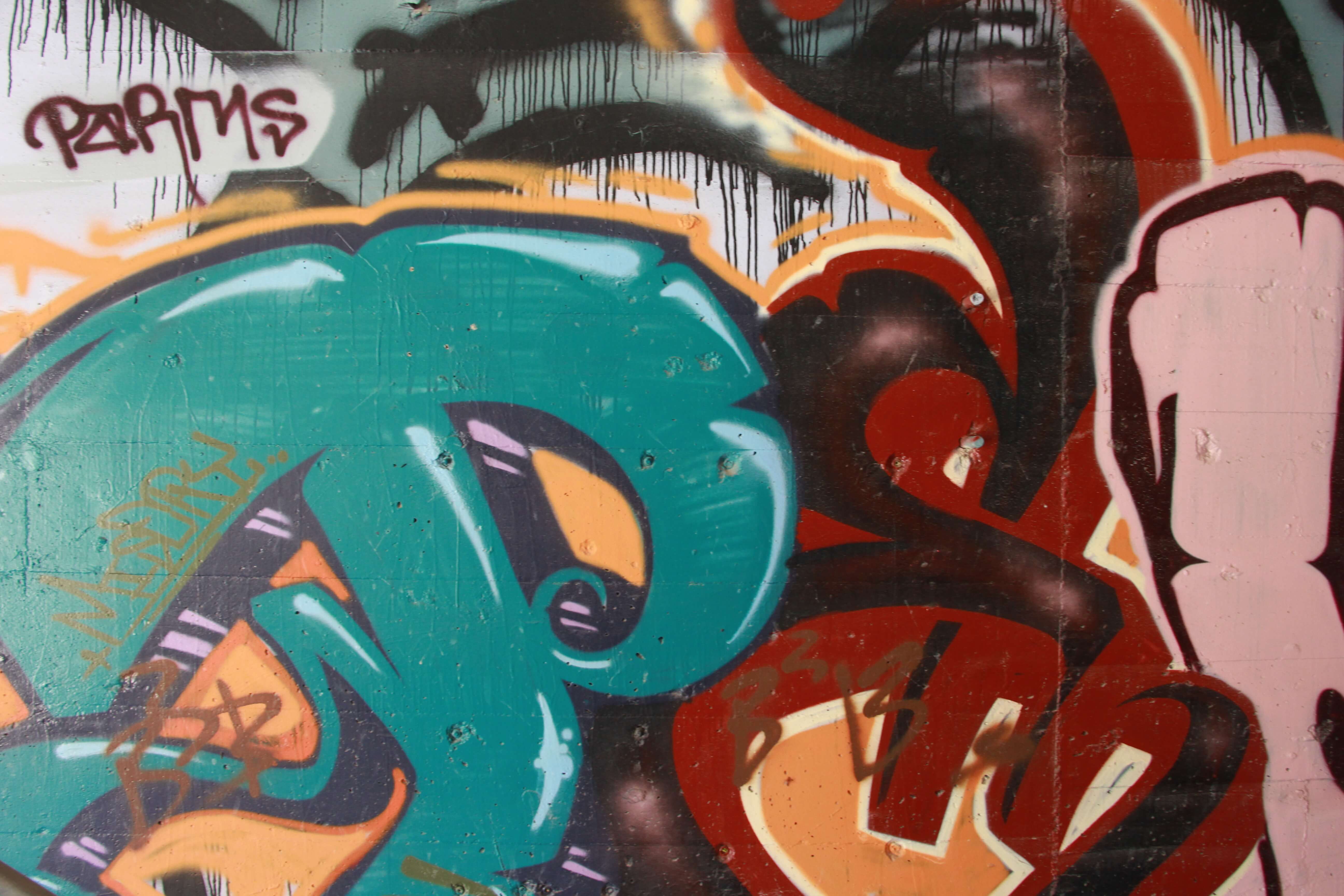 Green Red Letters Spray Painted Graffiti