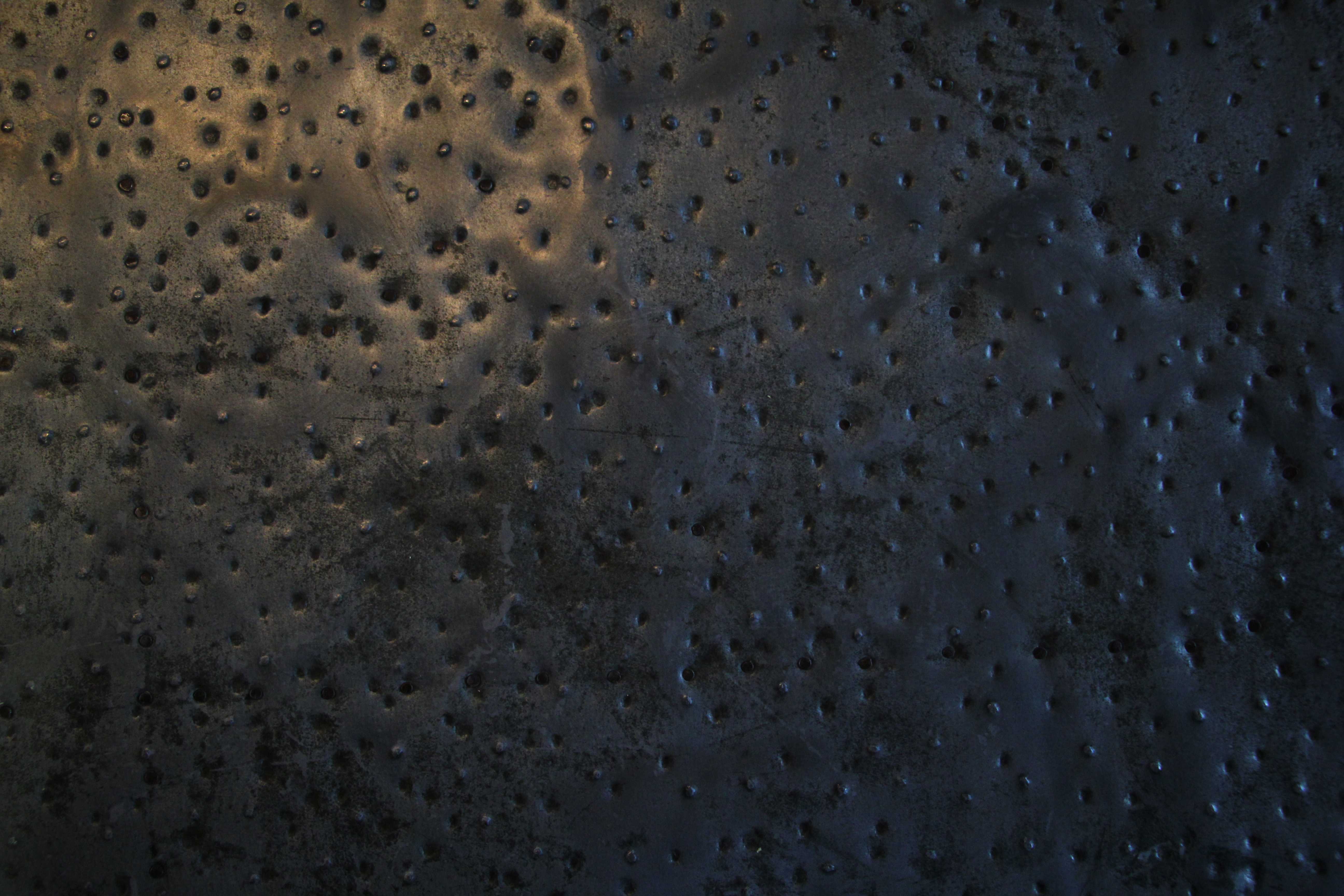 Metal Backsplash Dots At Night With Zoom In