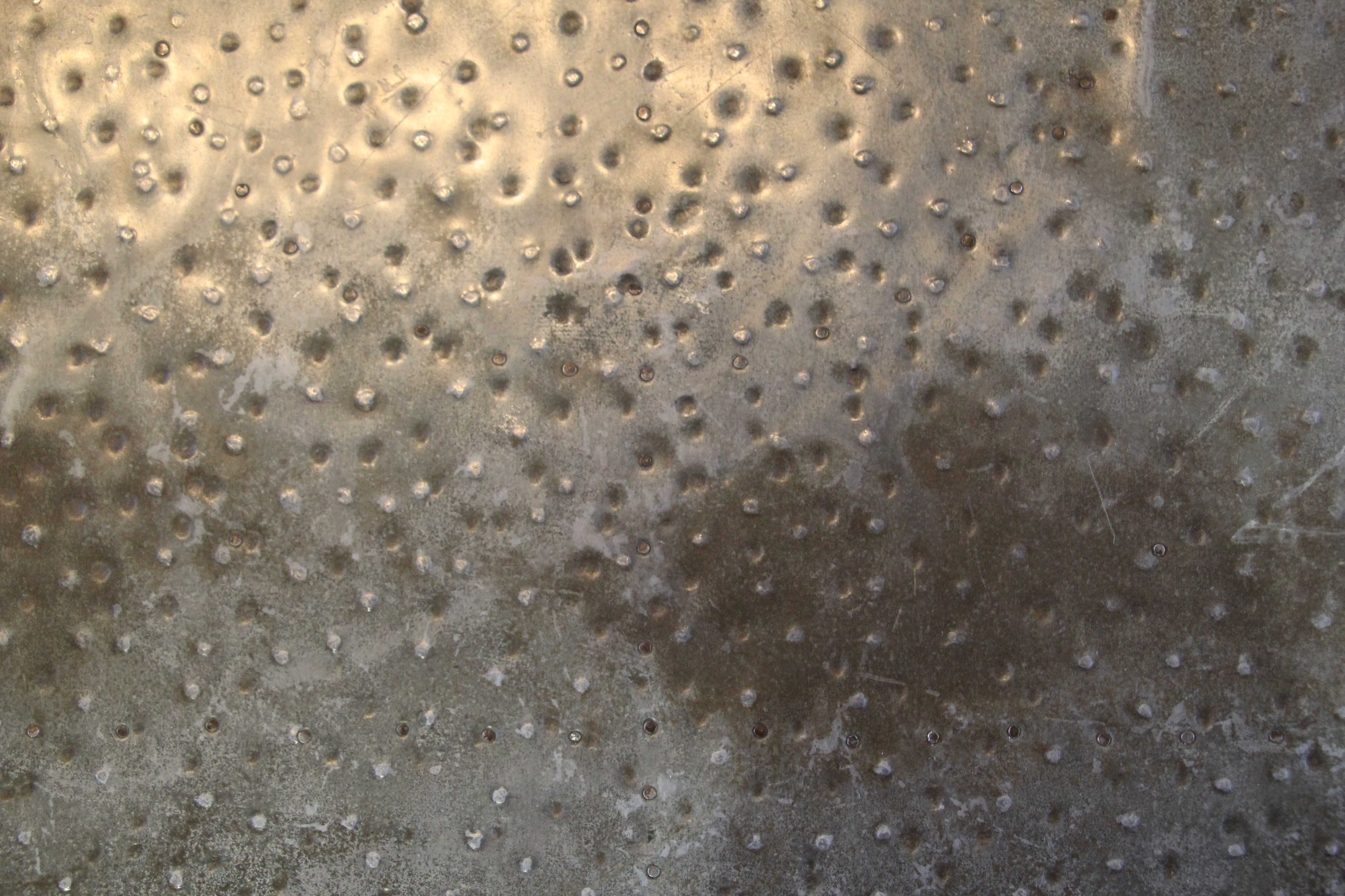 Metal Backsplash Dots Throughout