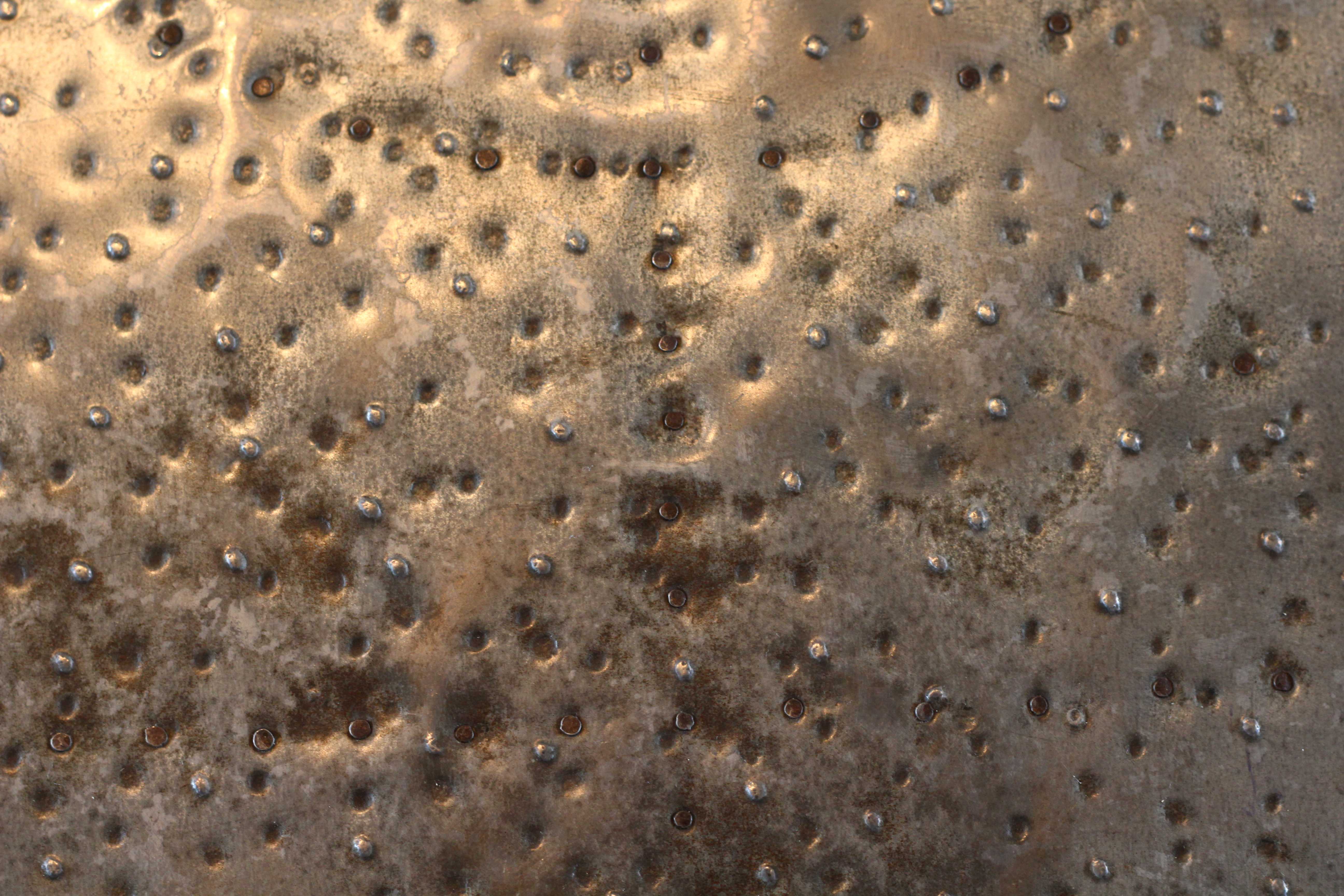 Metal Punctured Dots In Line