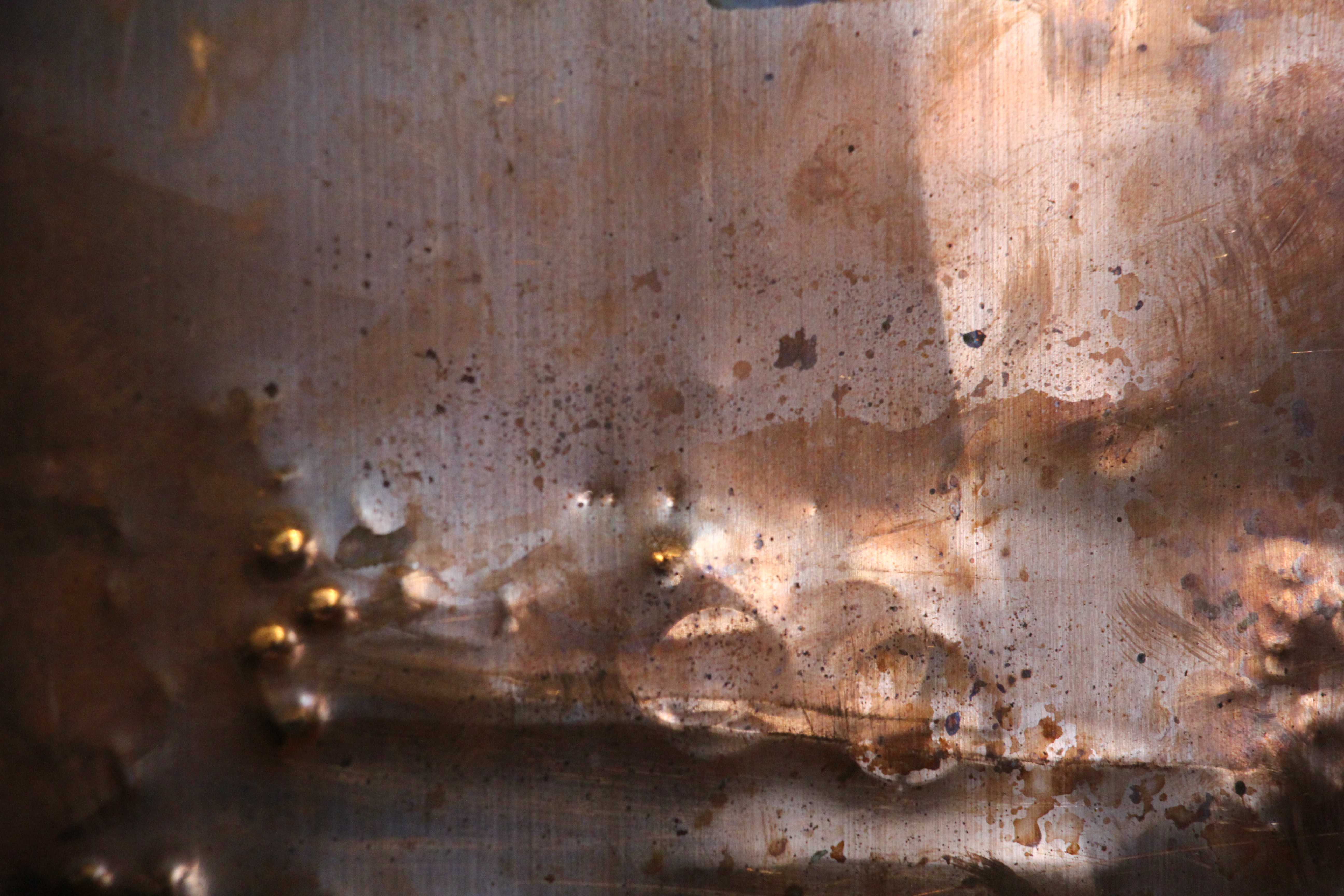 Metal Punctured Wall Photo