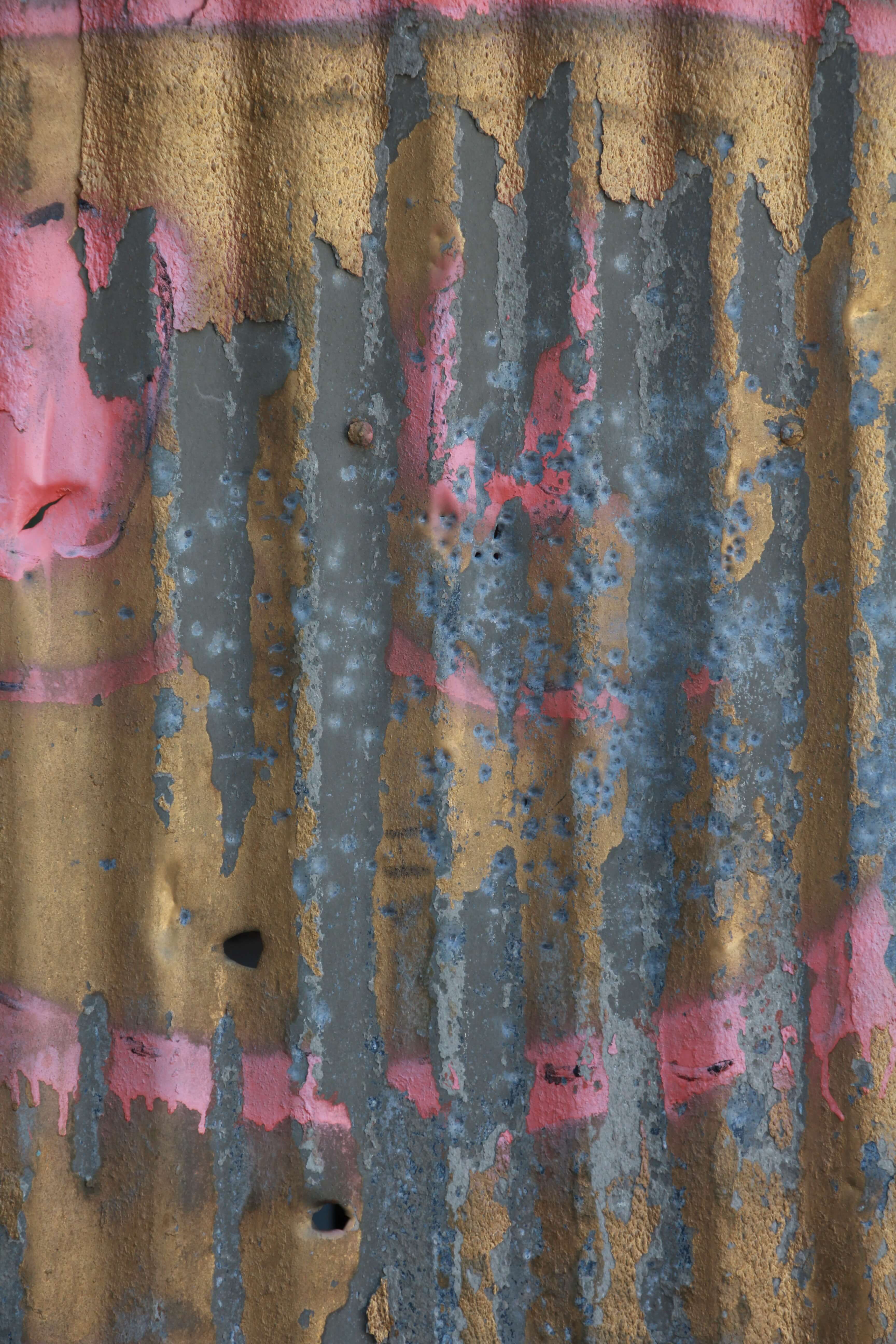 Pink Spray Graffiti On Metal Frame